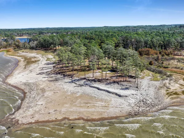 a view of a road with an ocean beach