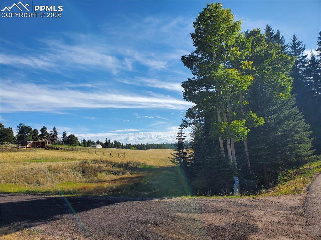 309 Pinaceae Heights Divide, CO 80814 - Photo 15 of 21 a view of an ocean with a building in the background