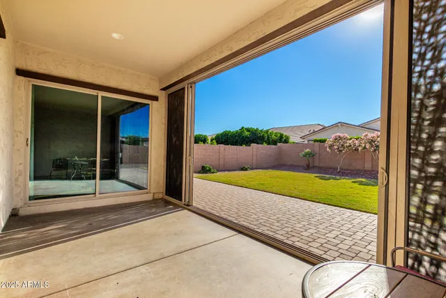 a view of swimming pool from a balcony