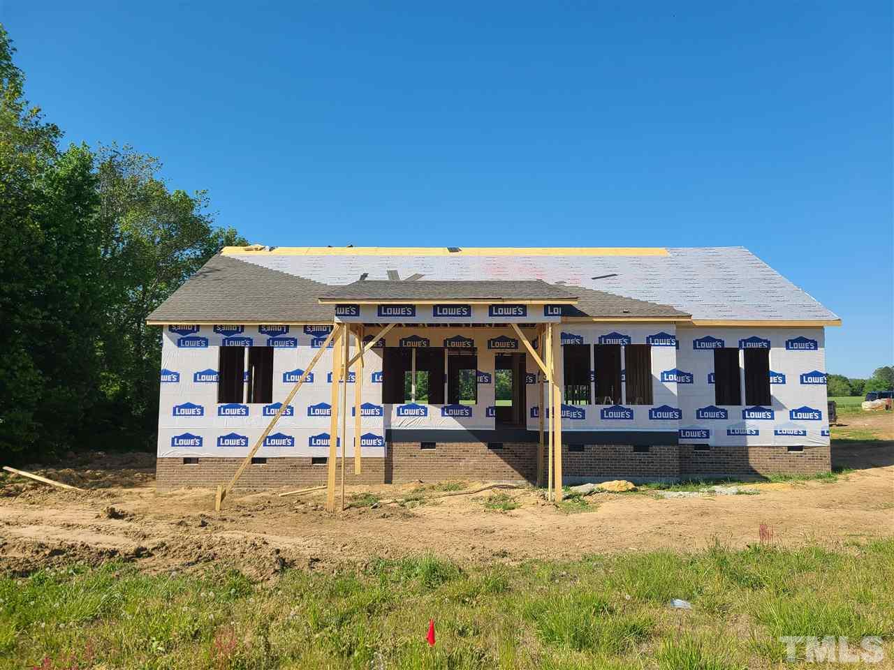 7149 Hill Road Spring Hope, NC 27882 - Photo 2 of 21 a view of a house with backyard patio and swimming pool