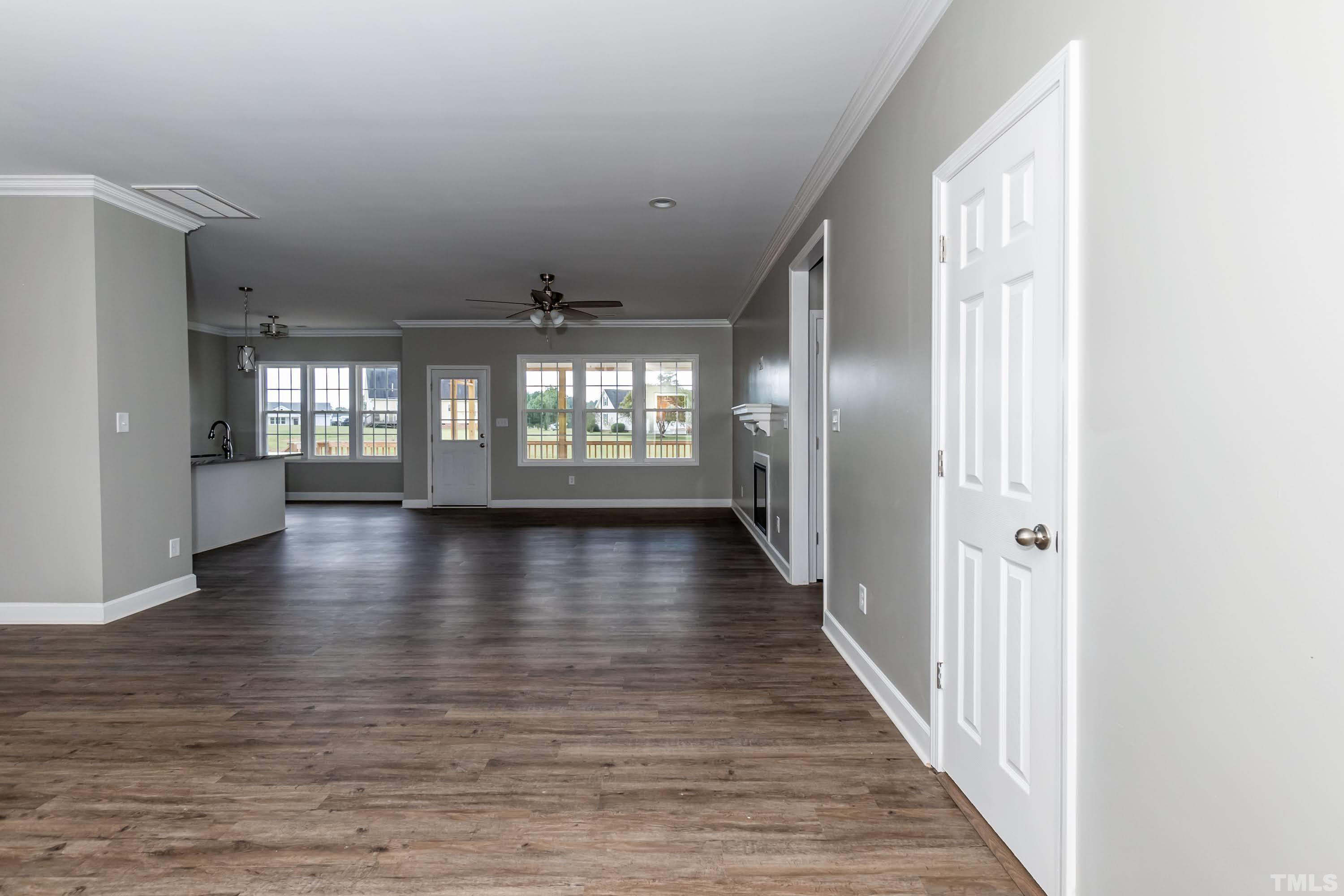 7149 Hill Road Spring Hope, NC 27882 - Photo 13 of 21 a view of interior space with wooden floor and windows