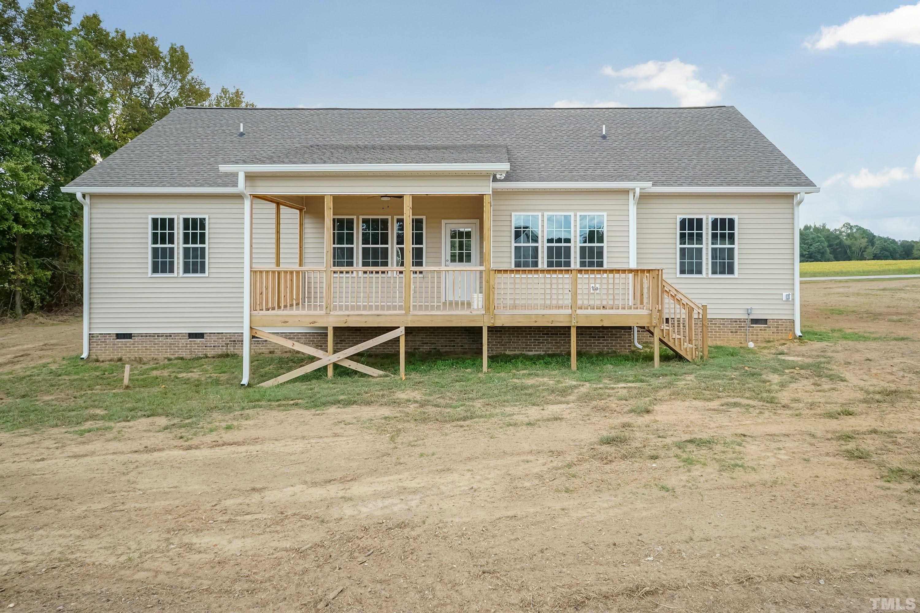7149 Hill Road Spring Hope, NC 27882 - Photo 5 of 21 front view of a house with a yard