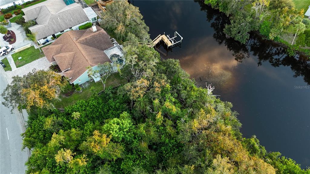 5402 Caruso Road Bradenton, FL 34203 - Photo 77 of 84 an aerial view of residential house with outdoor space and trees all around