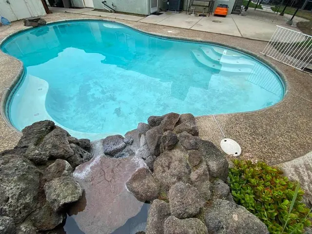 a view of a backyard with a small cabin