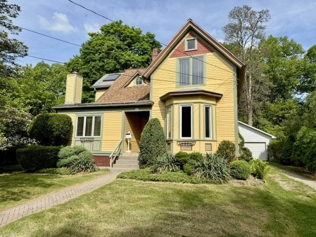 60 Massasoit Street Northampton, MA 01060 - Photo 1 of 19 a front view of a house with a yard