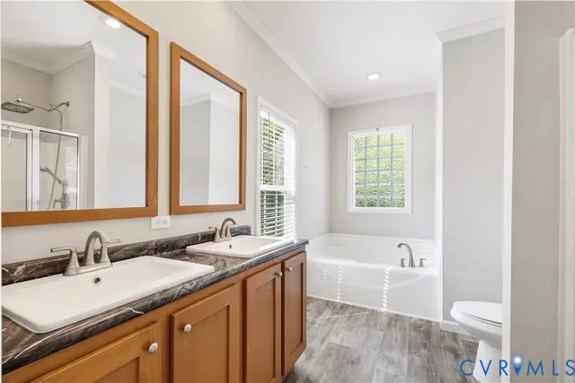a bathroom with a bathtub and window