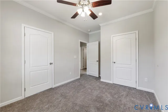 a view of a hallway with washer and dryer