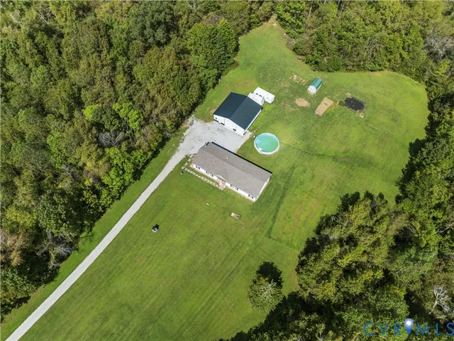 a view of a garden with a building