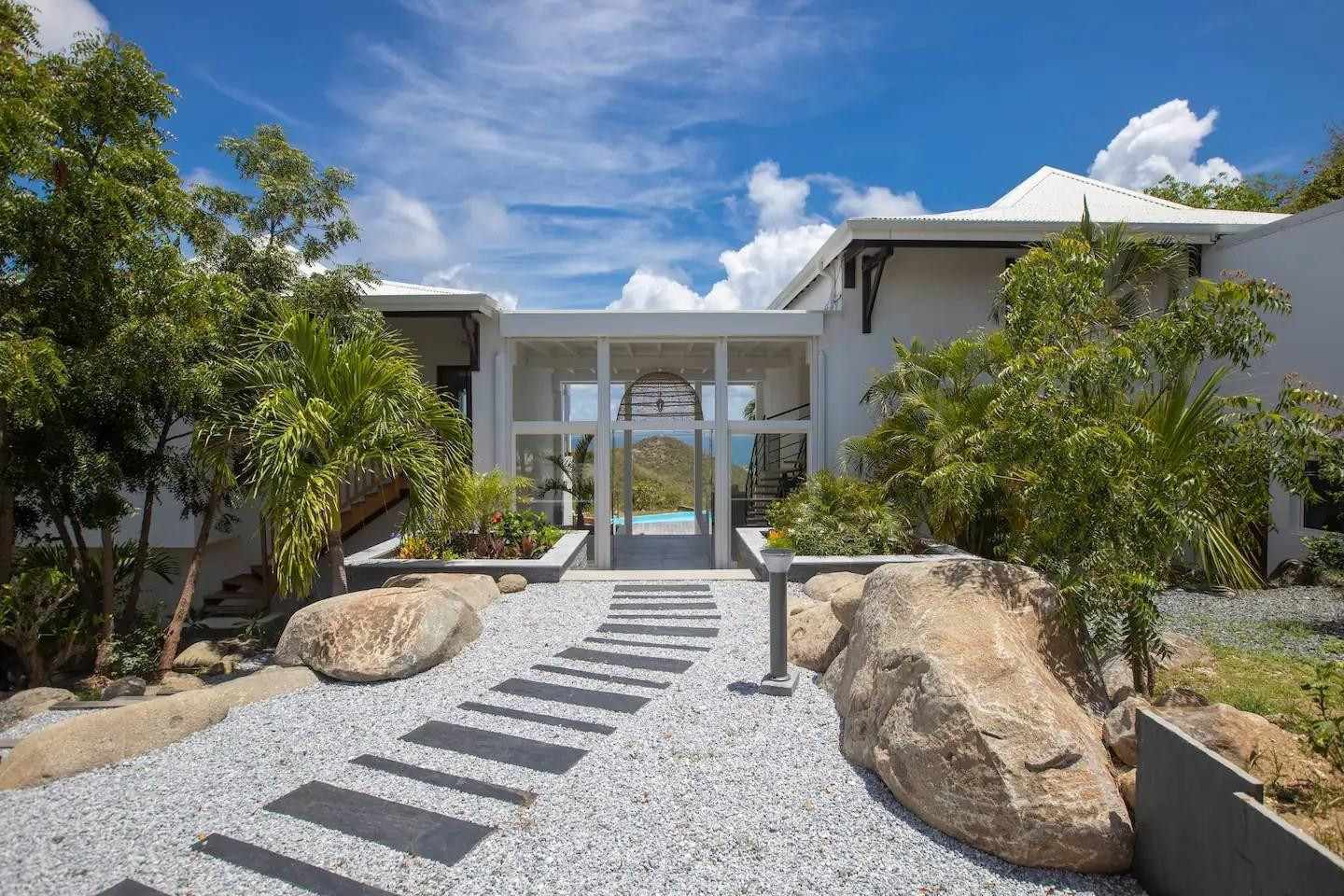 0 Anse Marcel undefined, undefined 00000 - Photo 6 of 15 a view of a house with backyard and sitting area