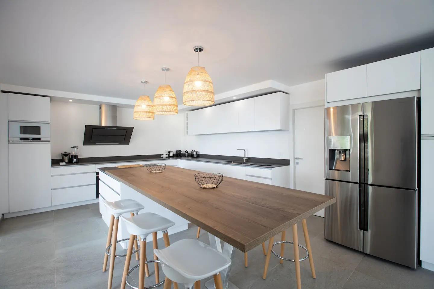 0 Anse Marcel undefined, undefined 00000 - Photo 9 of 15 a kitchen with stainless steel appliances granite countertop a sink a refrigerator and a stove