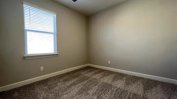 a view of a room with a window