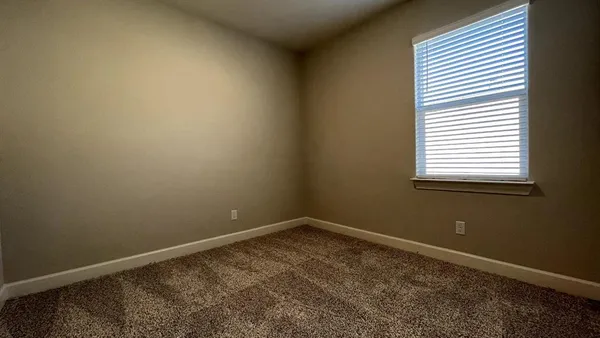 a view of a room with a window