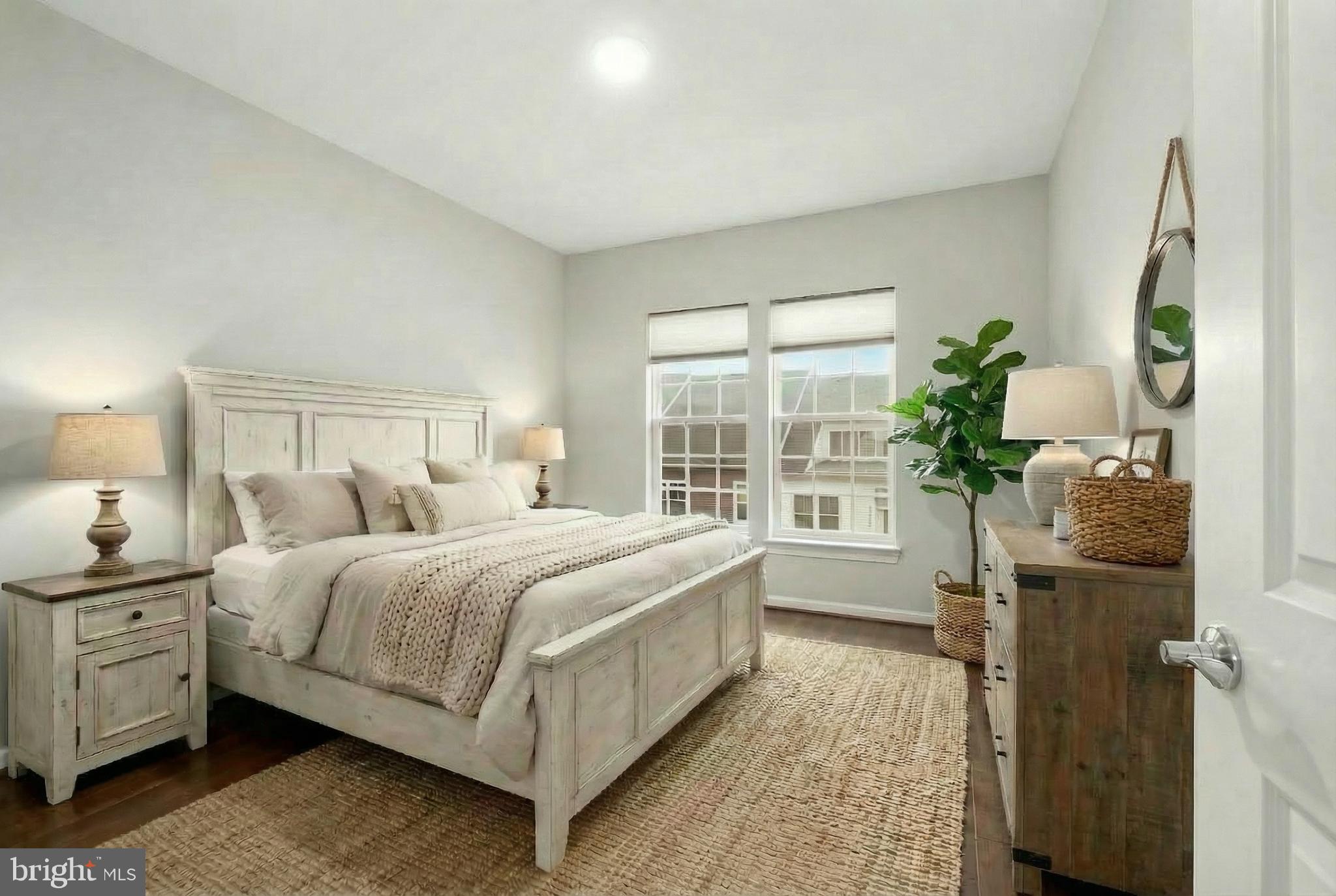 23517 Public House Road, Unit H Clarksburg, MD 20871 - Photo 37 of 49 a bedroom with a bed and a window