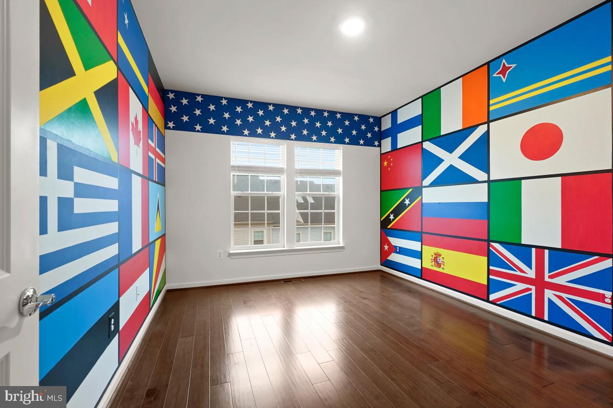 23517 Public House Road, Unit H Clarksburg, MD 20871 - Photo 42 of 49 a room with lots of multi story white walls