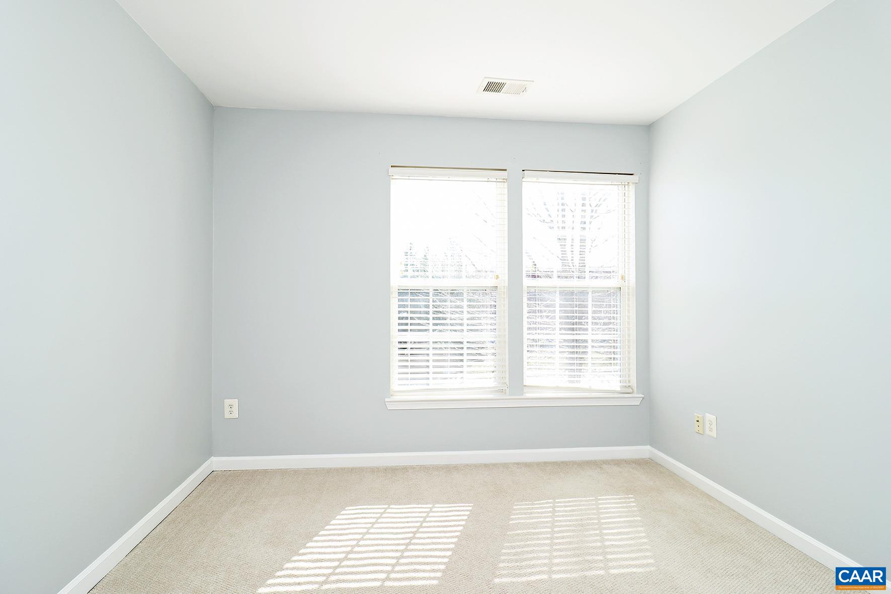 339 Rolkin Road Charlottesville, VA 22911 - Photo 13 of 22 a view of an empty room with a window