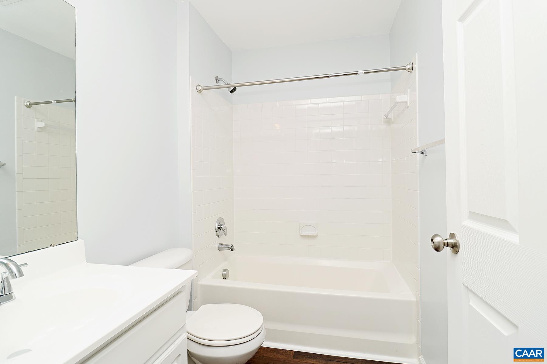 339 Rolkin Road Charlottesville, VA 22911 - Photo 14 of 22 a bathroom with a sink a toilet and a bathtub