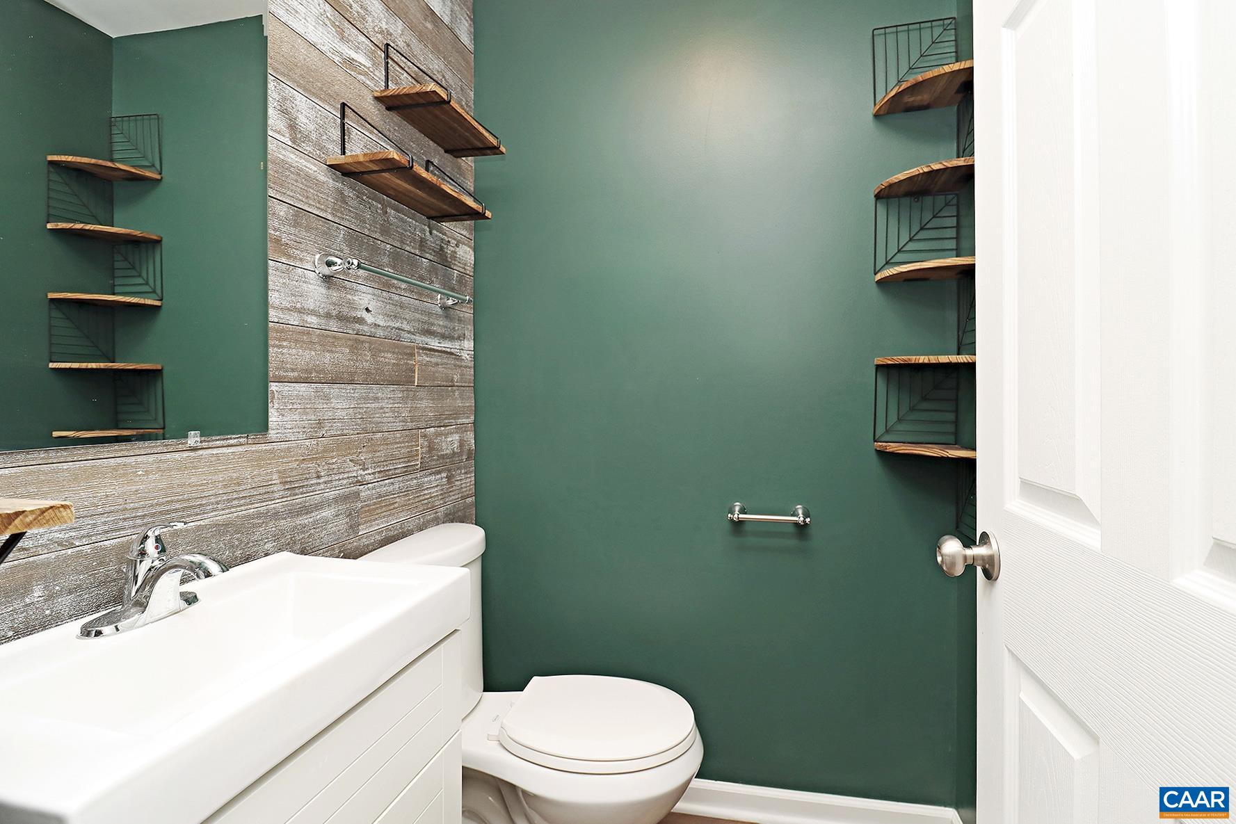 339 Rolkin Road Charlottesville, VA 22911 - Photo 18 of 22 a bathroom with a sink a toilet and shower