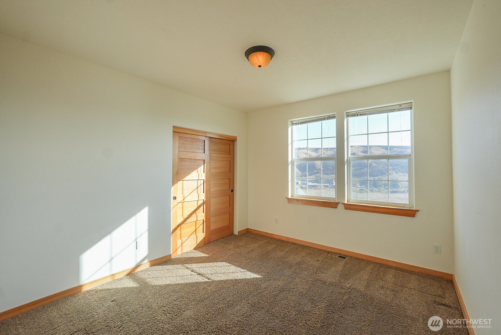 239 South Patit Road Dayton, WA 99328 - Photo 15 of 30 a view of an empty room with a window
