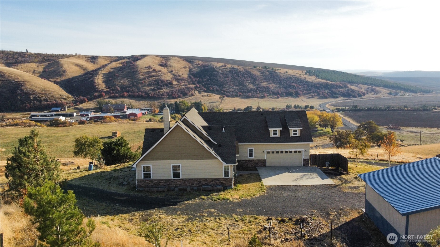 239 South Patit Road Dayton, WA 99328 - Photo 3 of 30 a view of a house with a yard