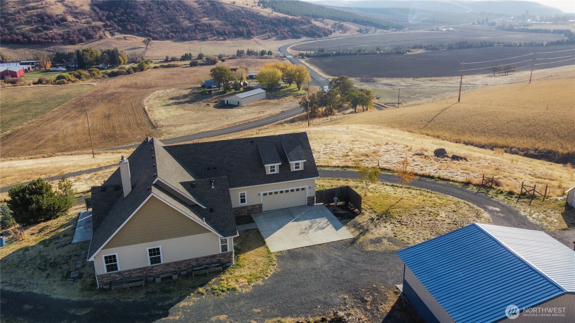 239 South Patit Road Dayton, WA 99328 - Photo 4 of 30 a view of a house with a yard