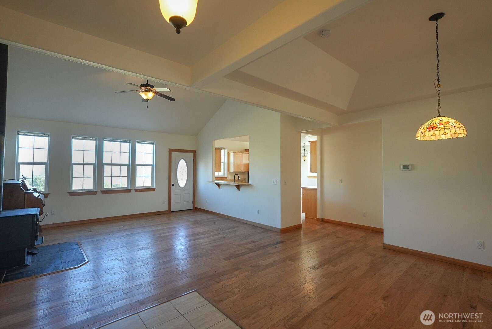 239 South Patit Road Dayton, WA 99328 - Photo 8 of 30 a view of an empty room with window and wooden floor