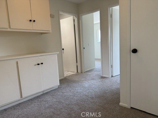 5281 Charing Cross Road Westminster, CA 92683 - Photo 10 of 25 Storage cabinet upstairs hallway