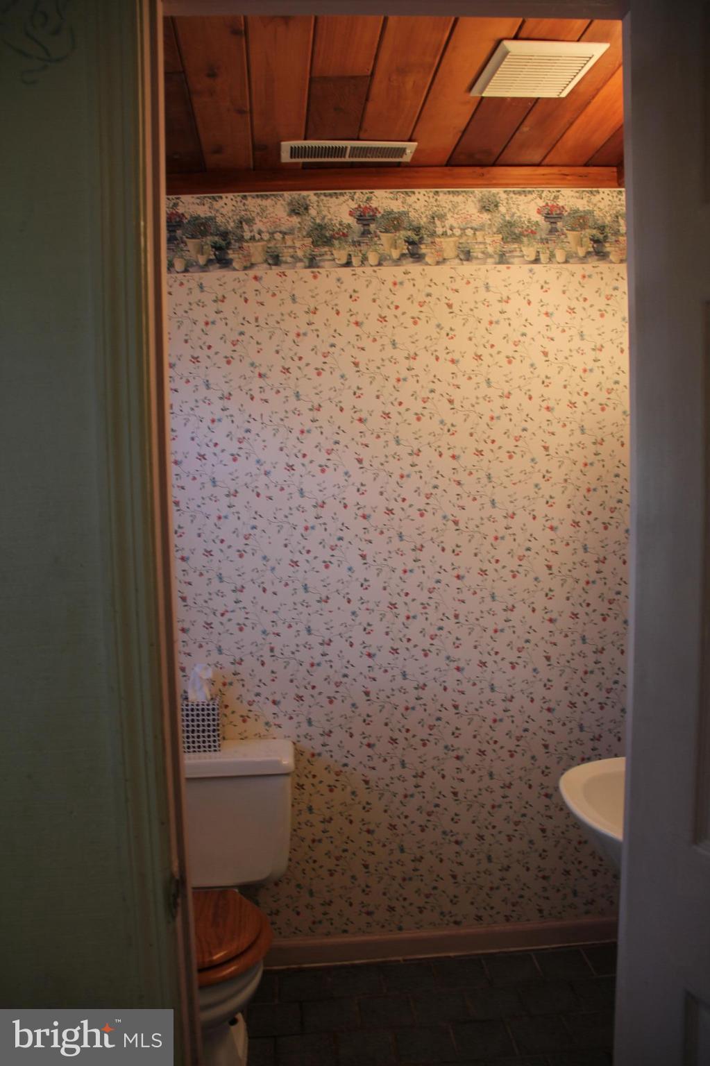 9509 Rocky Ridge Road Rocky Ridge, MD 21778 - Photo 12 of 25 a bathroom with a toilet