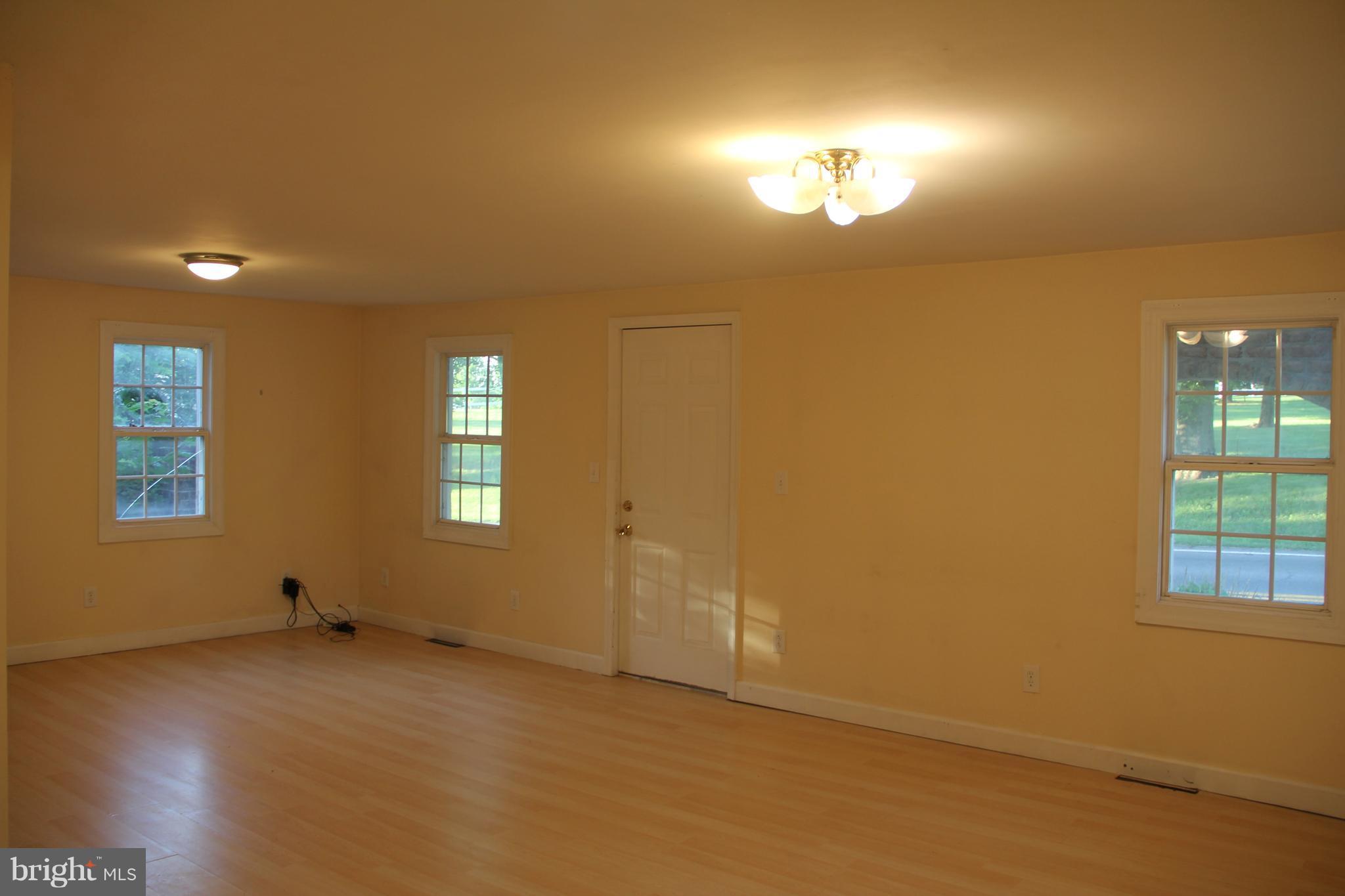 9509 Rocky Ridge Road Rocky Ridge, MD 21778 - Photo 13 of 25 an empty room with a window