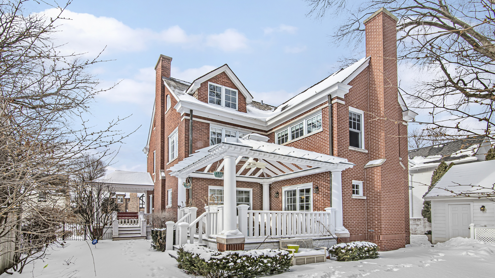159 Fuller Lane Winnetka, IL 60093 - Photo 3 of 13 a front view of a house with a yard