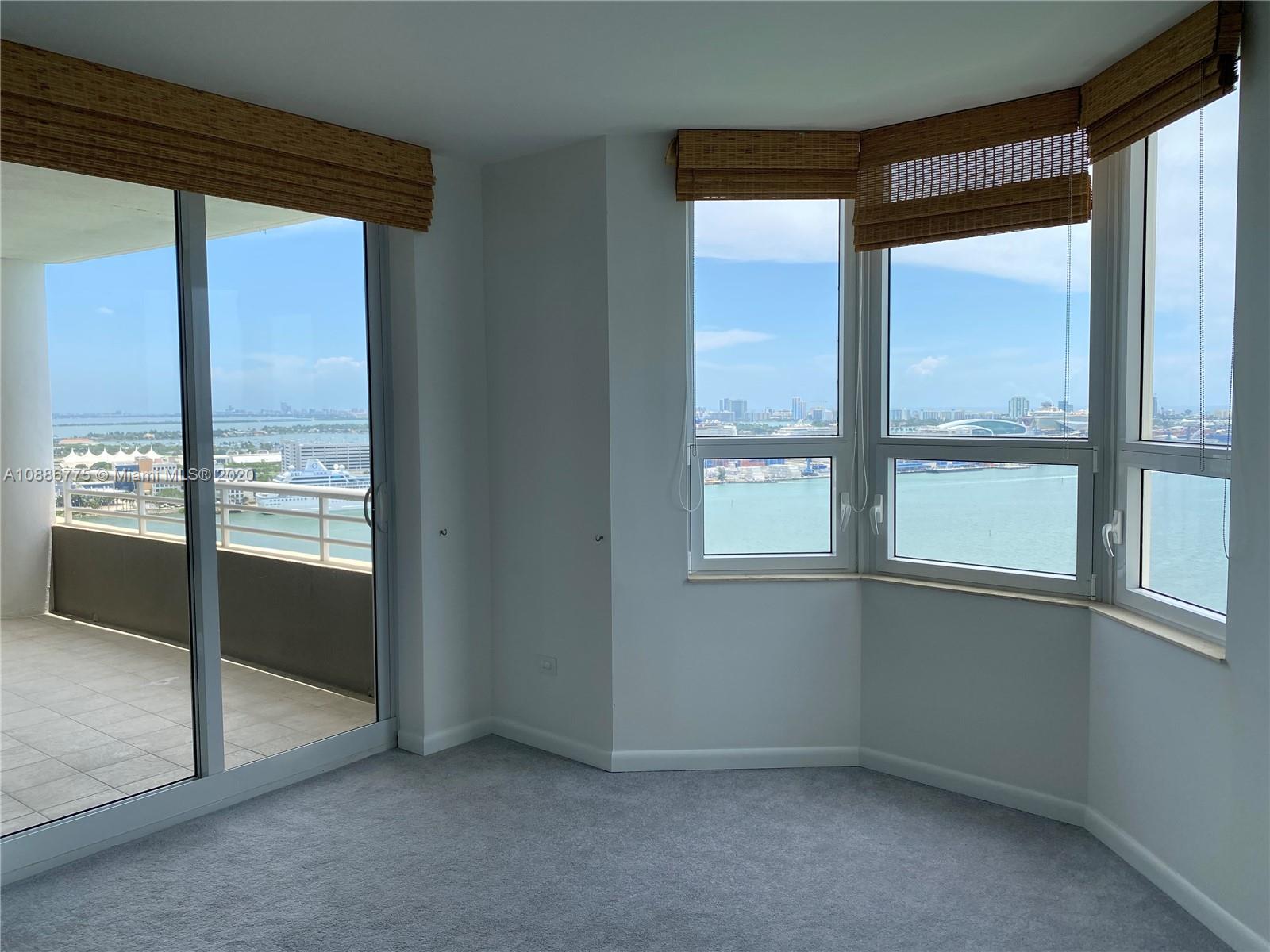 808 Brickell Key Drive, Unit 2601 Miami, FL 33131 - Photo 15 of 29 an empty room with a window