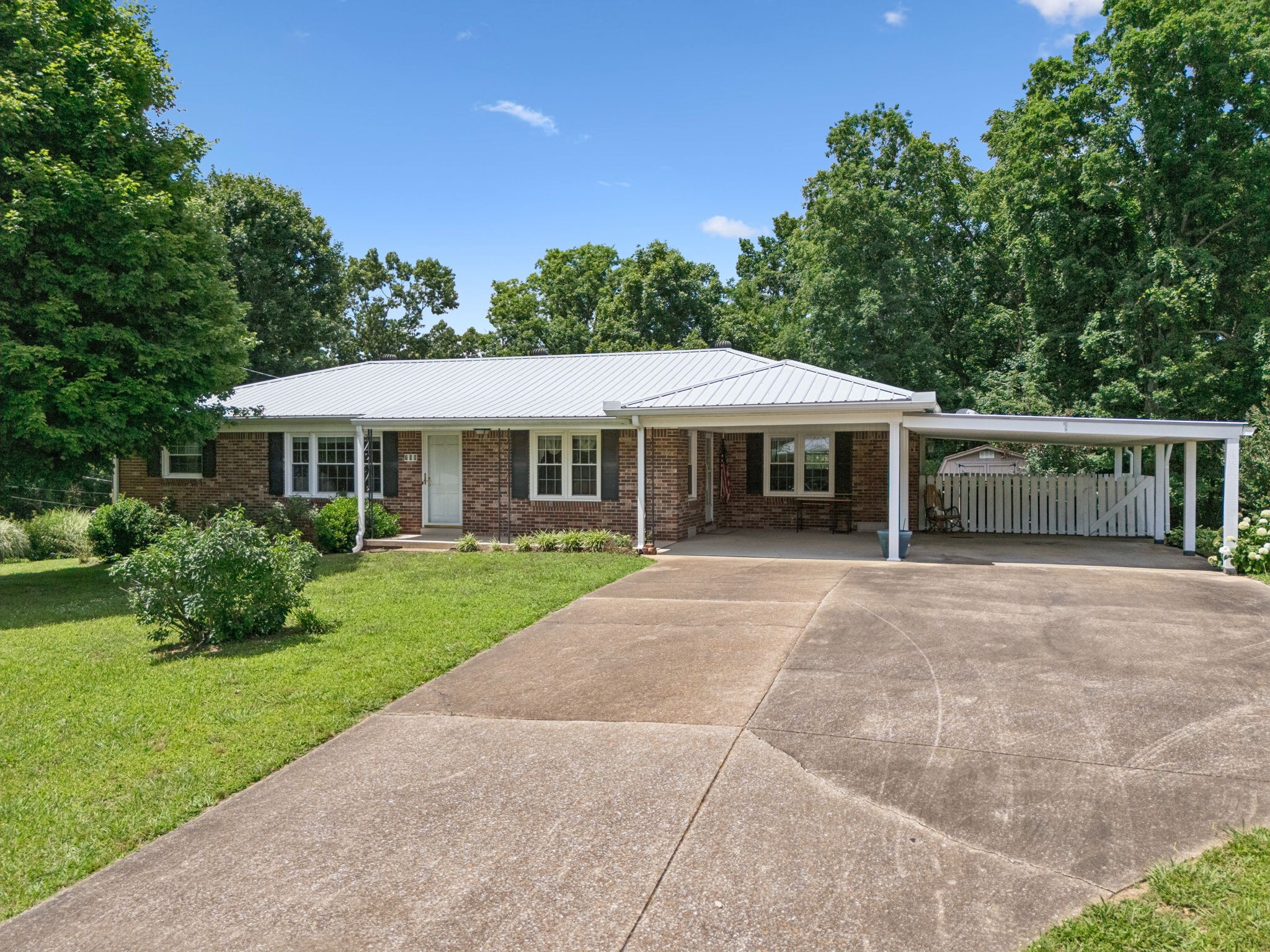 708 Hickory Street Centerville, TN 37033 - Photo 55 of 57 a front view of a house with a yard