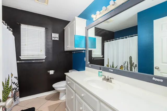 a bed room with a bed and a couch