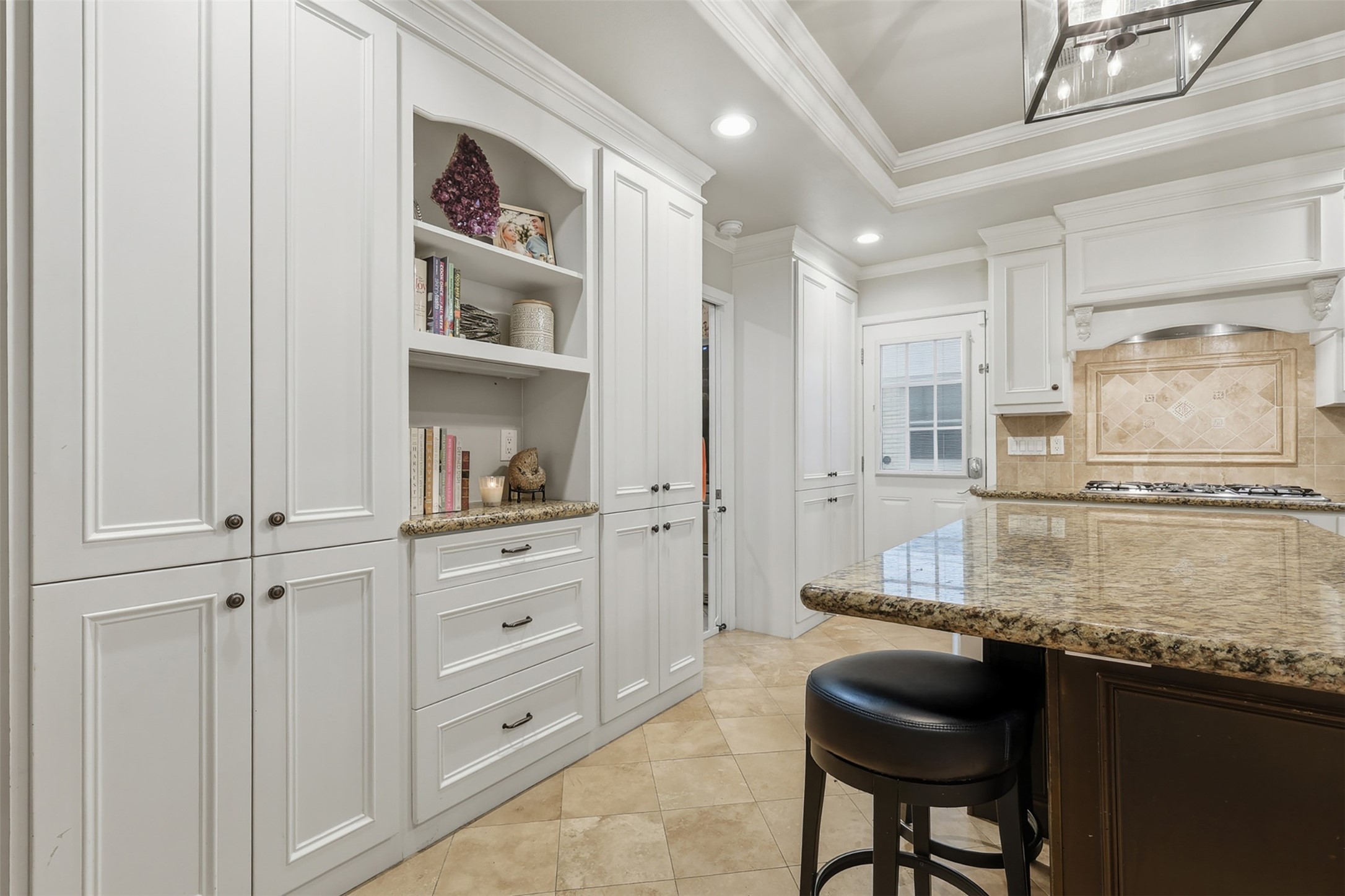 6236 Locke Lane Houston, TX 77057 - Photo 14 of 34 a kitchen with stainless steel appliances granite countertop a stove and a refrigerator