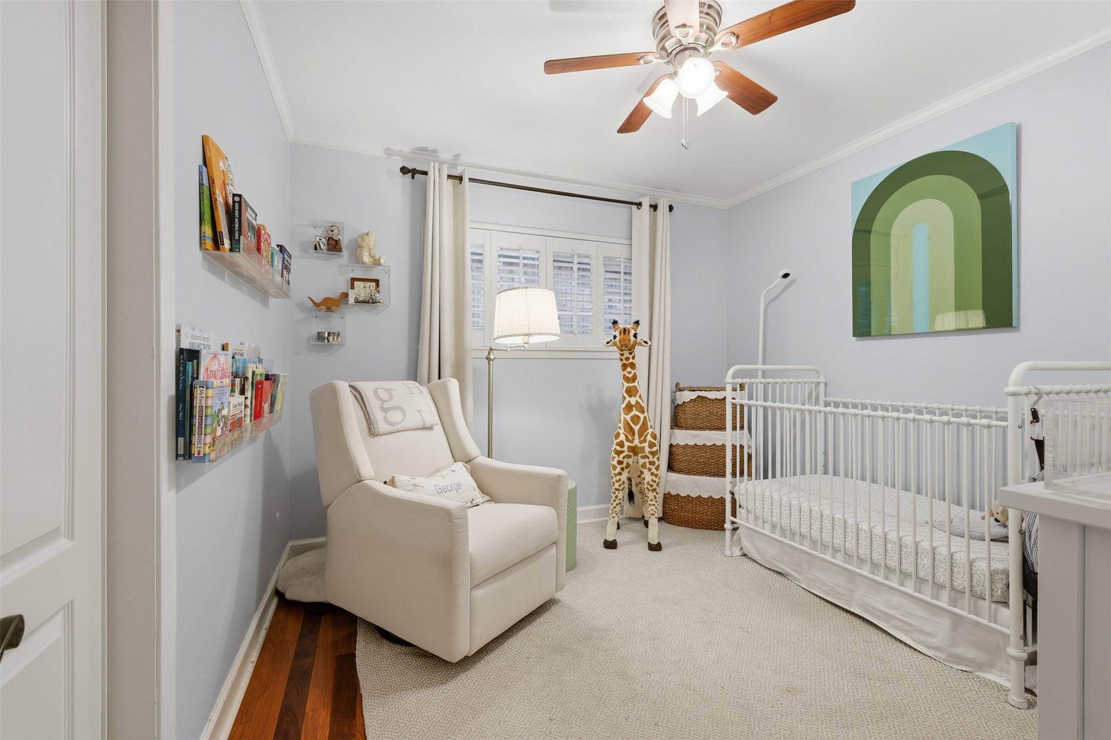 6236 Locke Lane Houston, TX 77057 - Photo 19 of 34 a living room with a baby crib furniture and a window