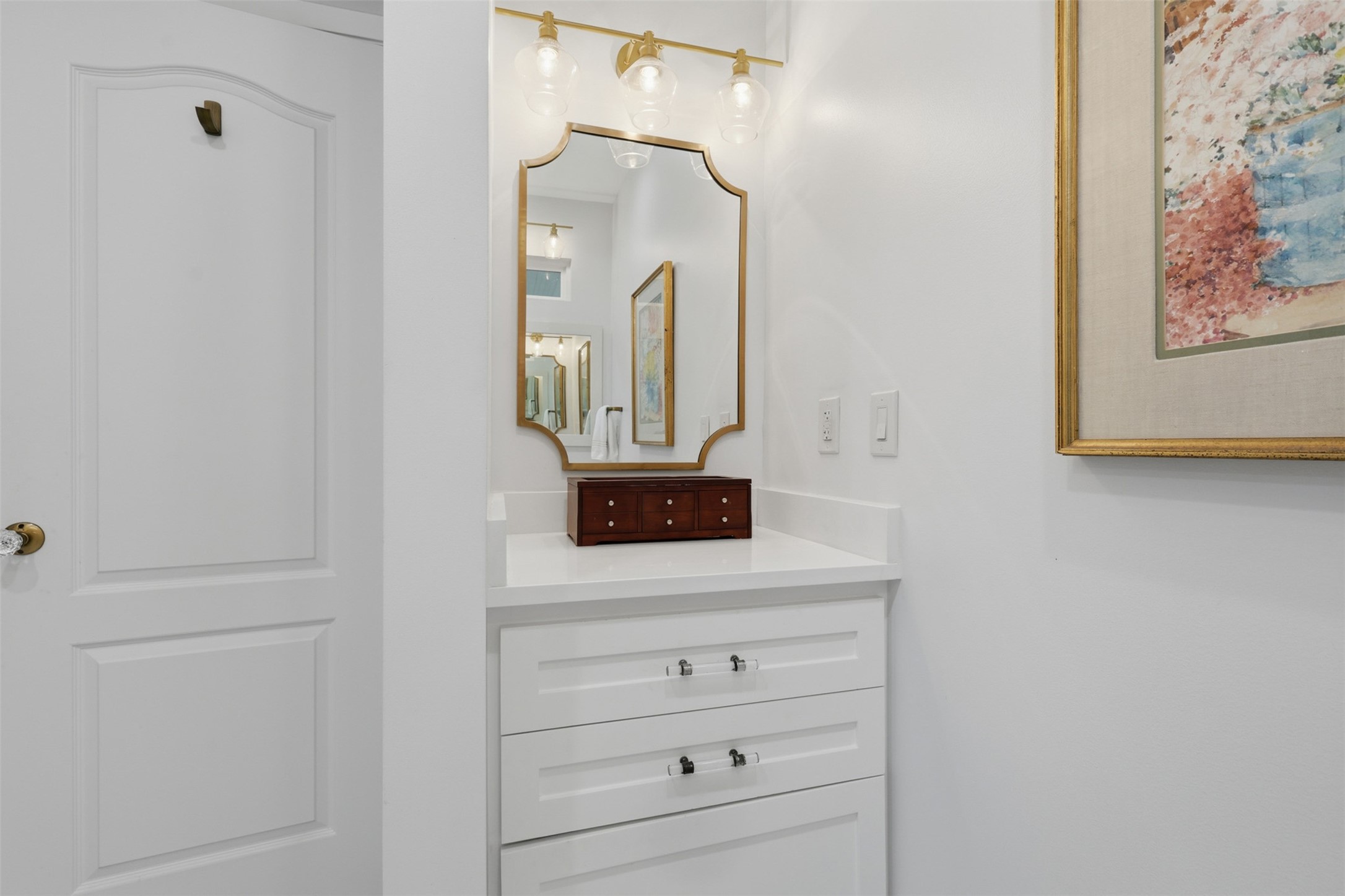 6236 Locke Lane Houston, TX 77057 - Photo 24 of 34 a bathroom with a sink and a mirror
