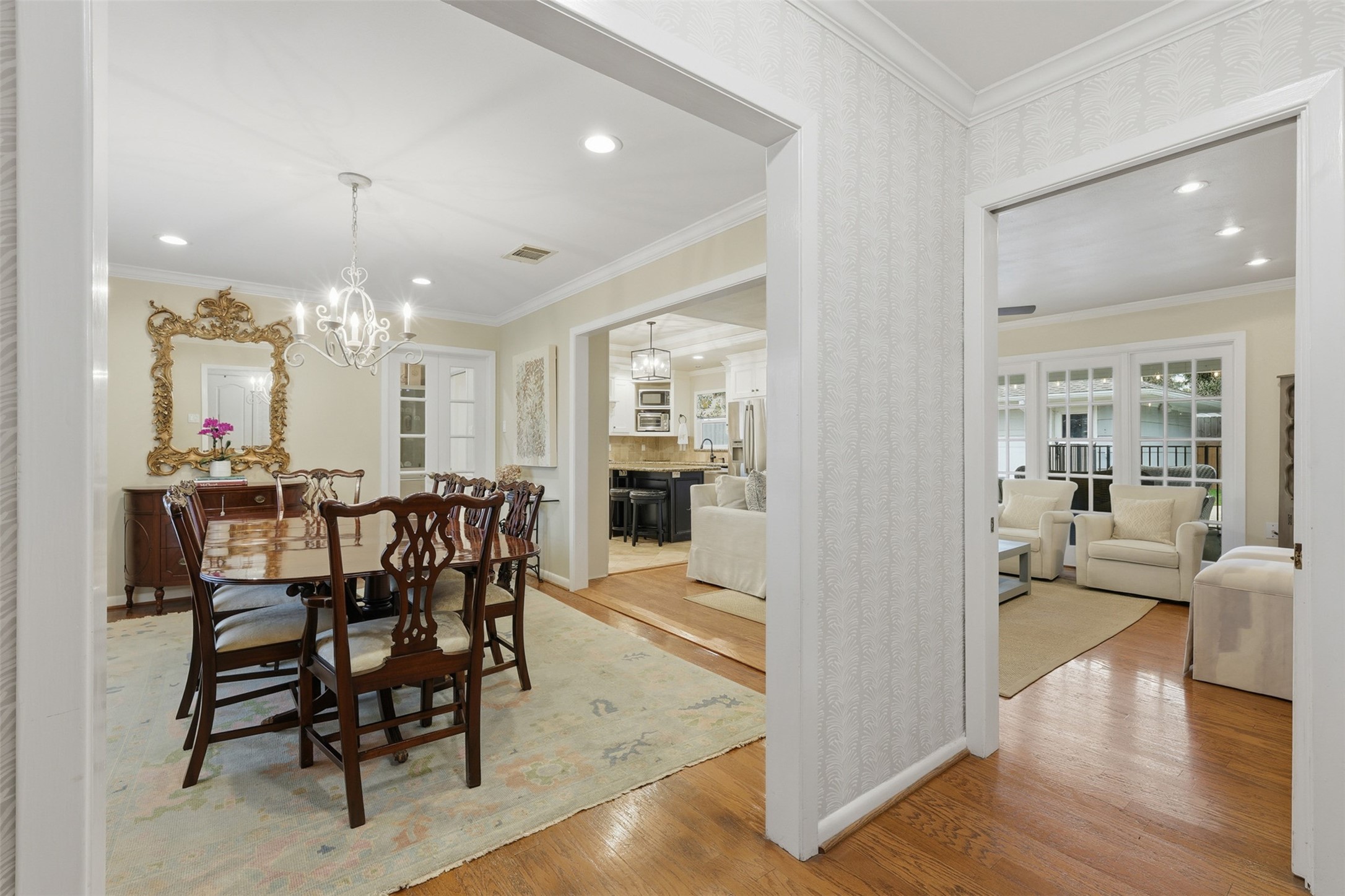 6236 Locke Lane Houston, TX 77057 - Photo 4 of 34 a view of a dining room with furniture and wooden floor