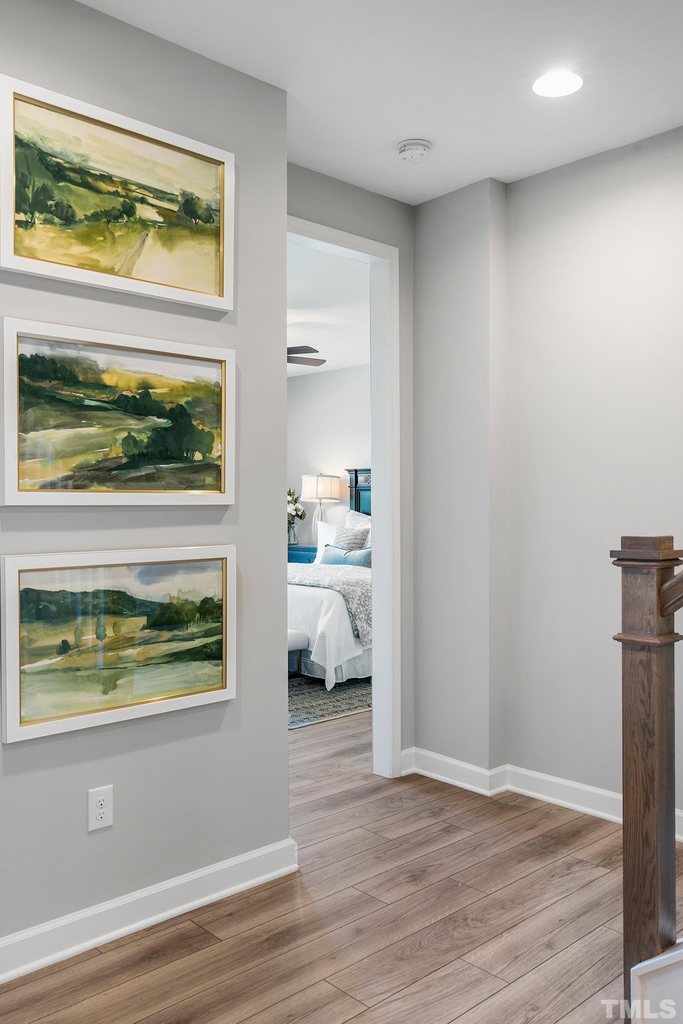 1016 Manchaca Loop, Unit 4 Apex, NC 27539 - Photo 17 of 36 a view of hallway with furniture and a window