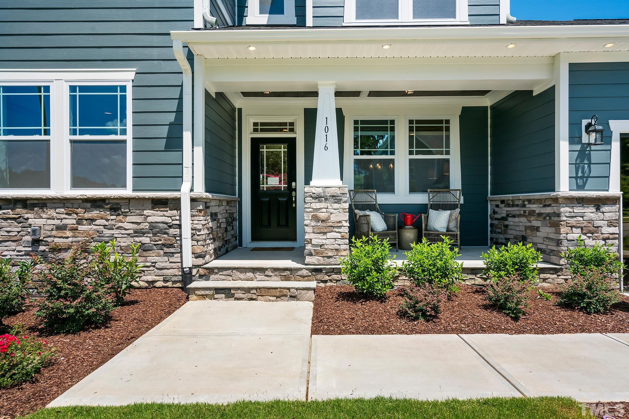 1016 Manchaca Loop, Unit 4 Apex, NC 27539 - Photo 36 of 36 a front view of a house