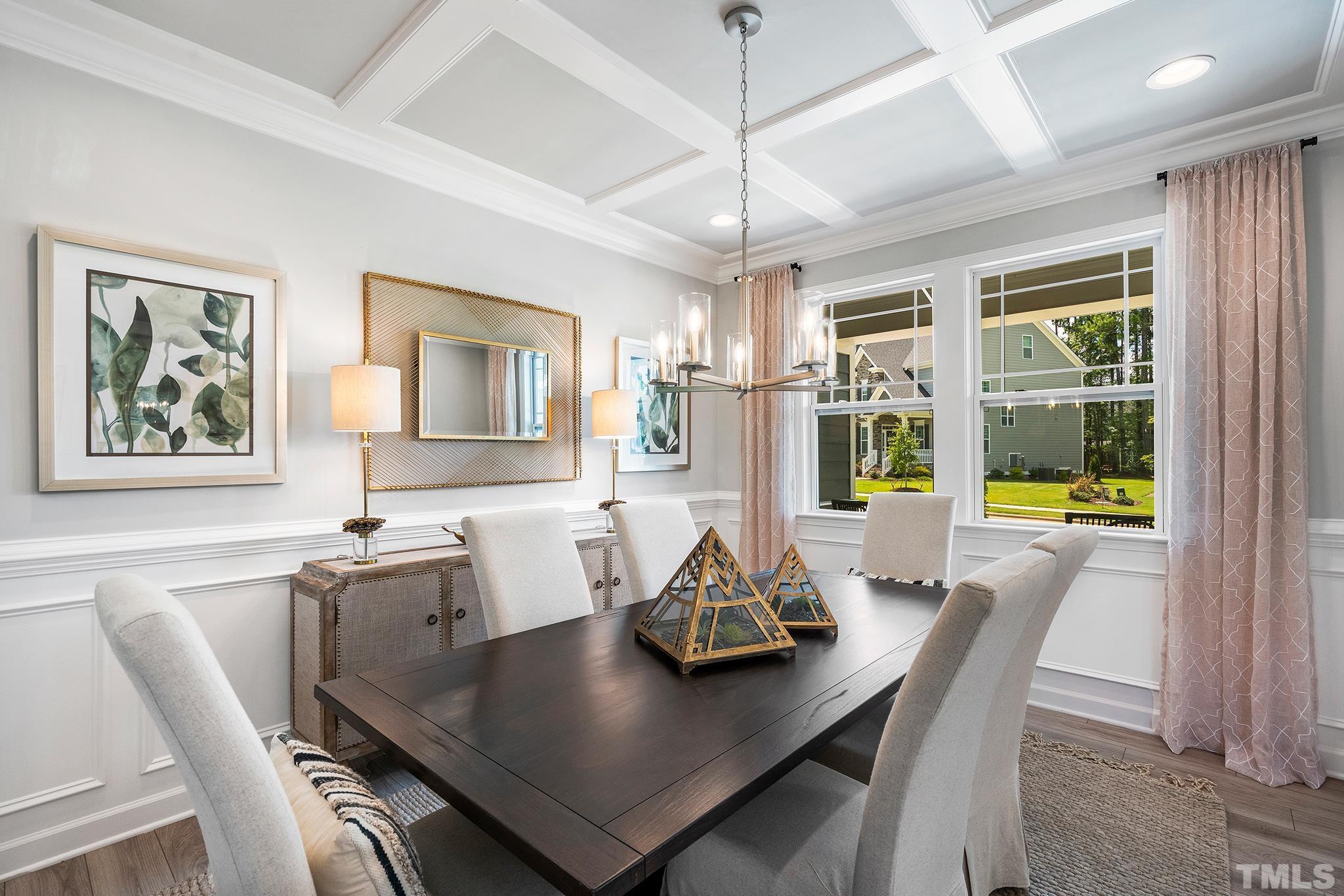 1016 Manchaca Loop, Unit 4 Apex, NC 27539 - Photo 9 of 36 a view of a dining room with furniture window and outside view