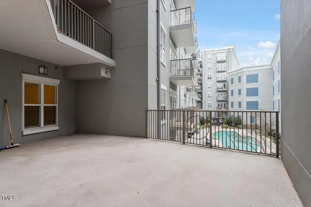 a view of an empty room with a balcony