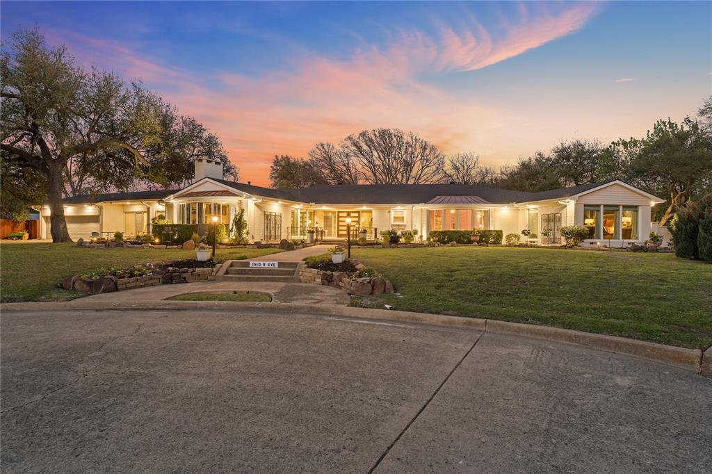 a view of an house with outdoor space and sitting area