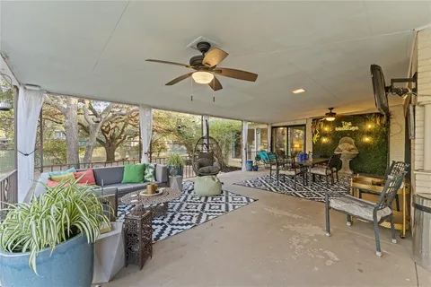 a view of a fountain in front of a house