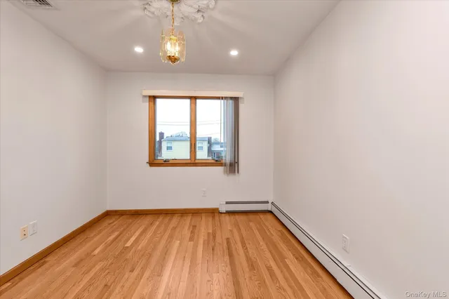 $1,099,000 | 203 Pershing Parkway, Mineola, NY 11501