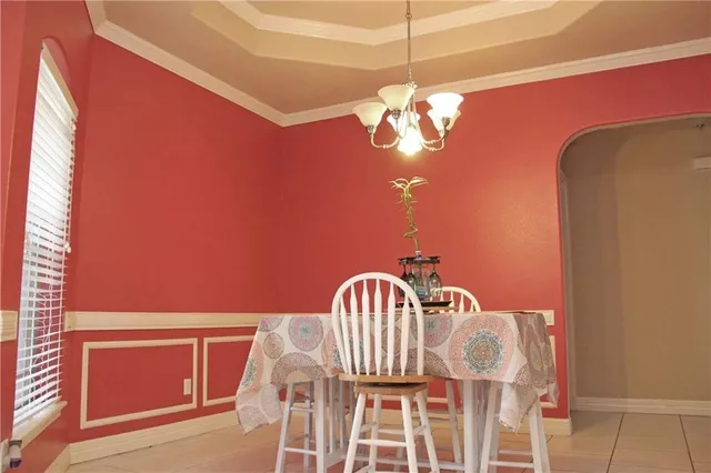 a view of a balcony with a chandelier