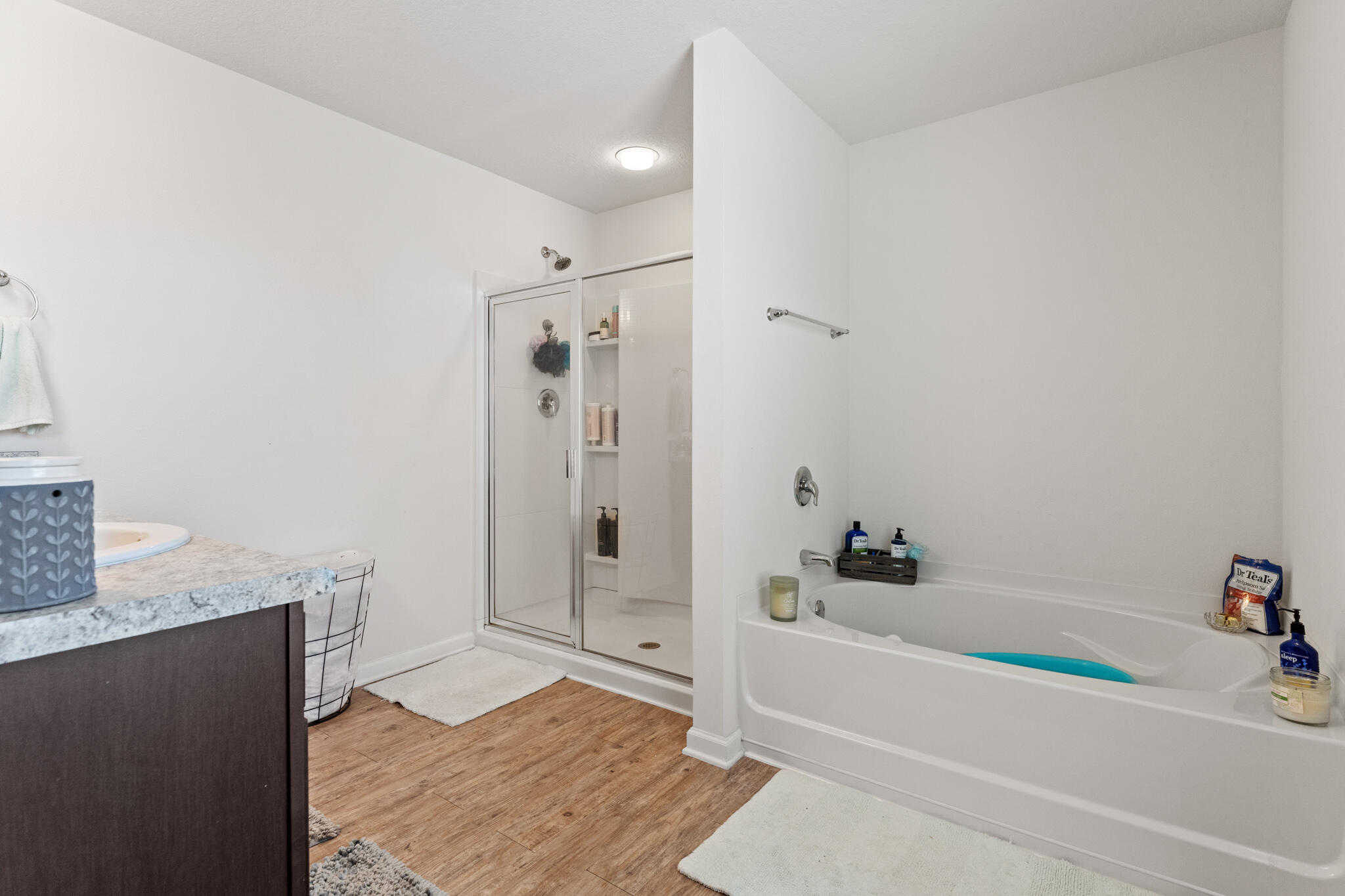 745 Widgeon Way Crestview, FL 32539 - Photo 17 of 29 a bathroom with a granite countertop tub shower and sink