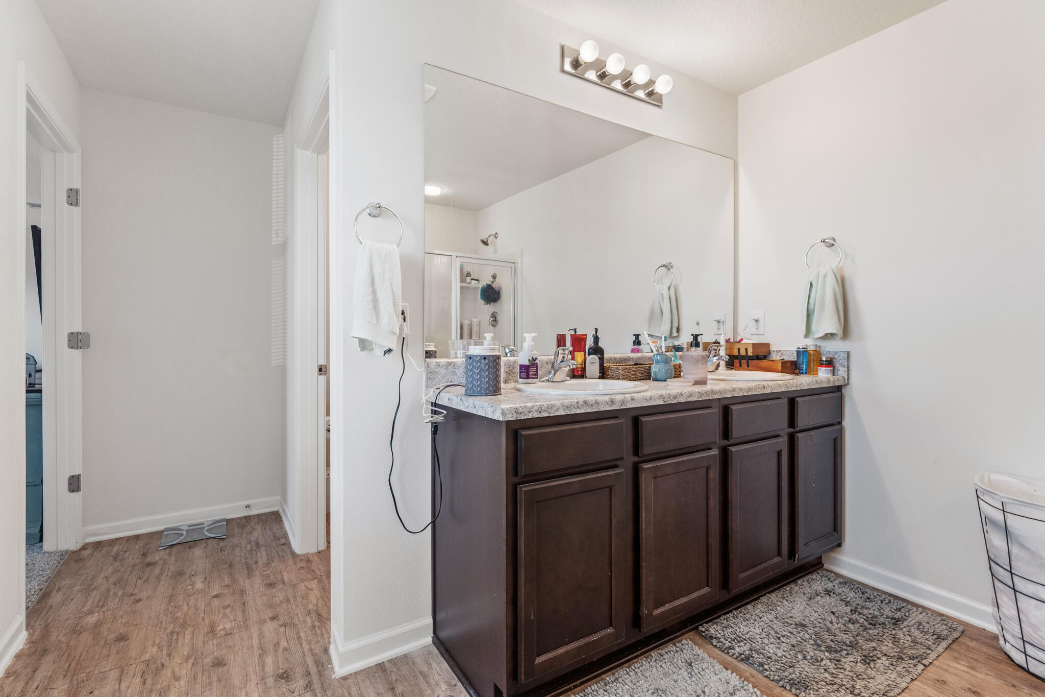 745 Widgeon Way Crestview, FL 32539 - Photo 18 of 29 a bathroom with a sink vanity and mirror