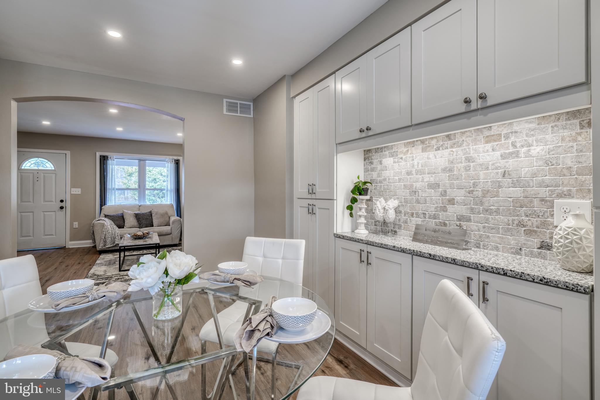 3015 Vulcan Road Dundalk, MD 21222 - Photo 14 of 42 WALL OF CABINETS w/TUMBLED STONE & GRANITE!