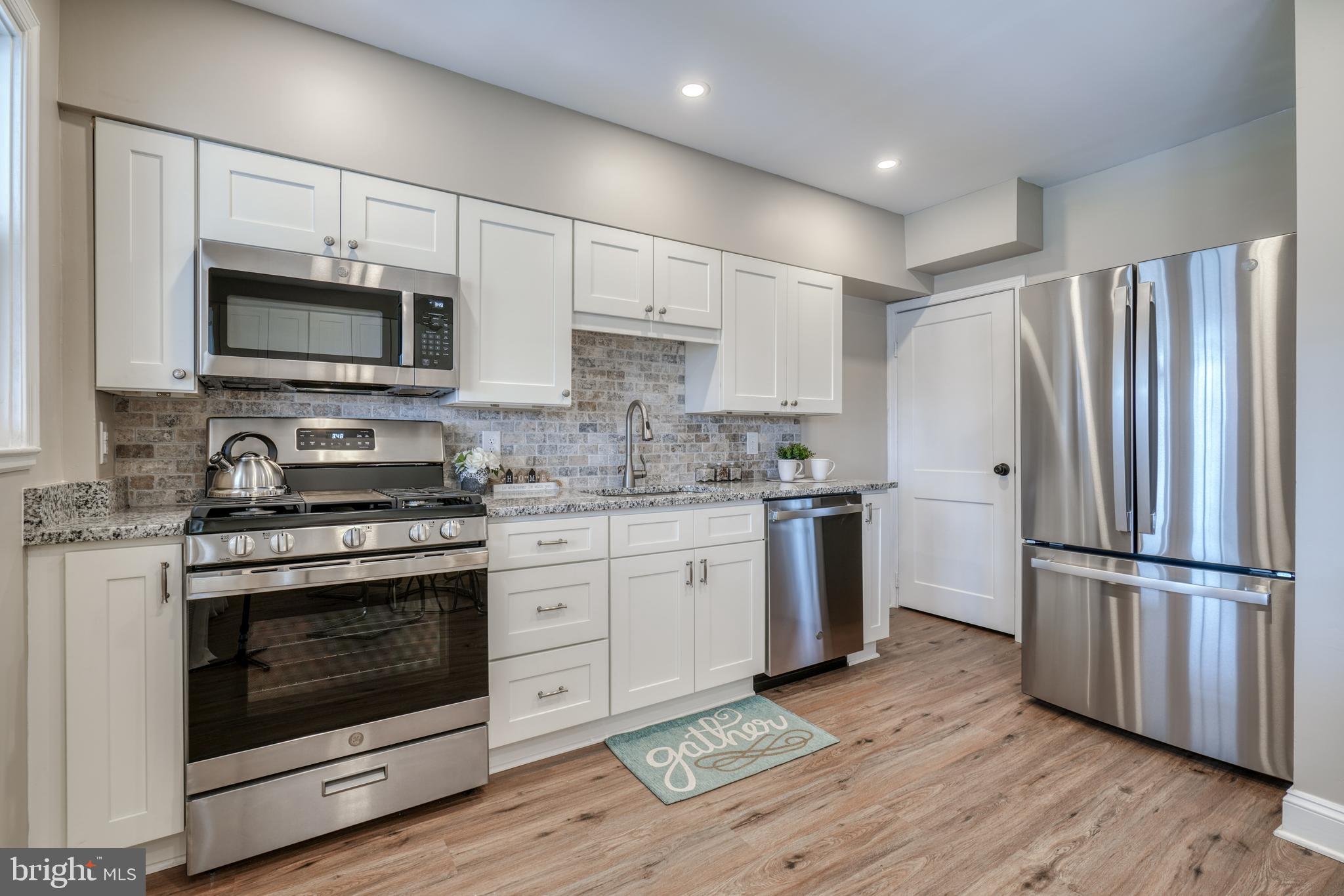 3015 Vulcan Road Dundalk, MD 21222 - Photo 18 of 42 SOFT-CLOSE CABINETRY, GRANITE, SS APPLIANCES!