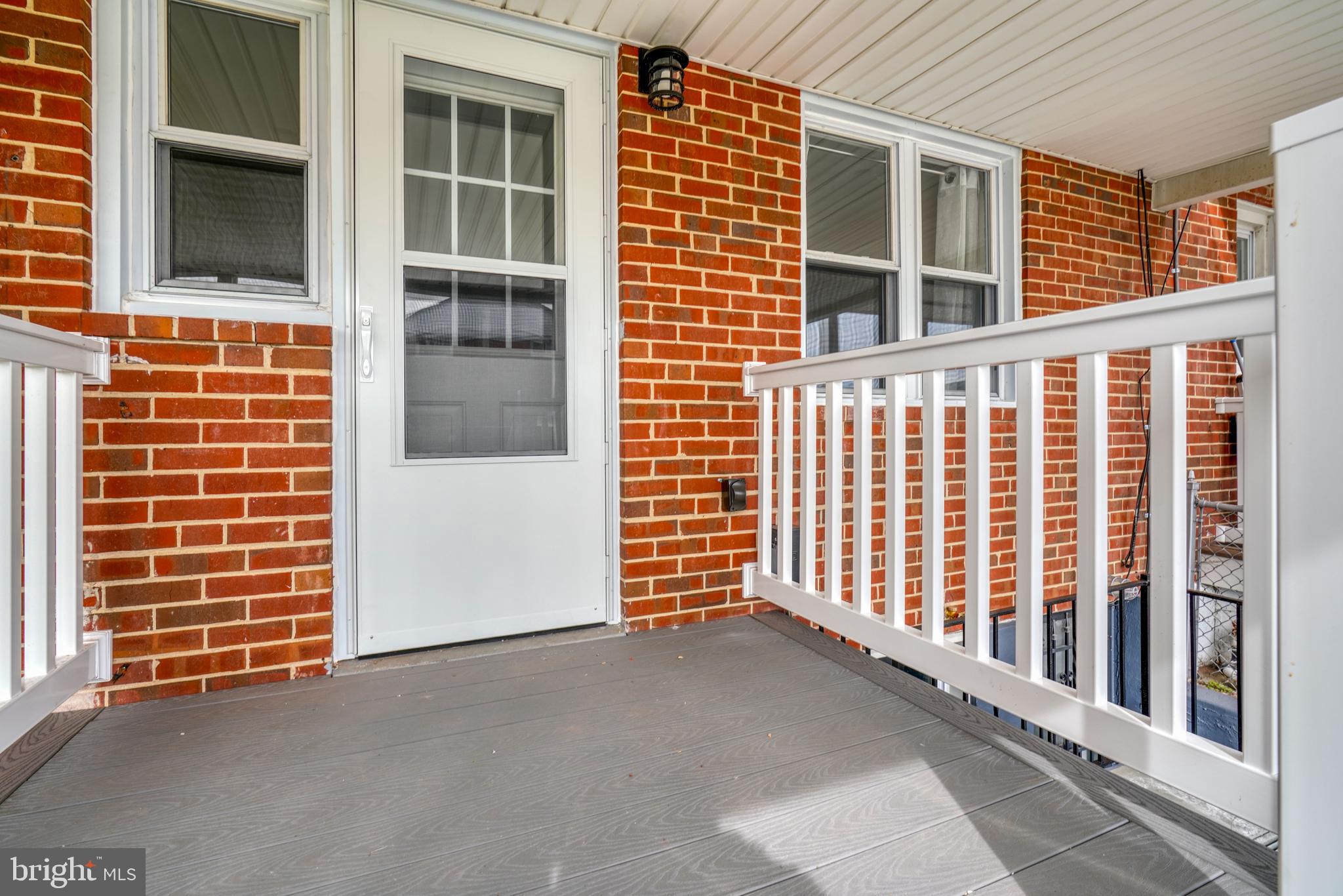 3015 Vulcan Road Dundalk, MD 21222 - Photo 38 of 42 BACK DOOR & PATIO w/COVERED ENTRY!