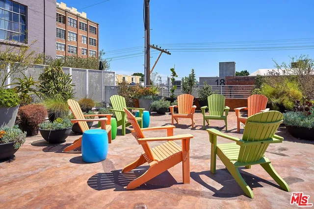 a view of a terrace with furniture